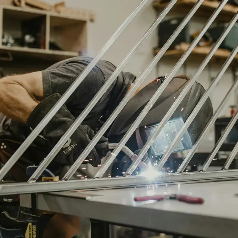 Spatter-free robotic laser welding assembling the laser-cut fitness equipment frame