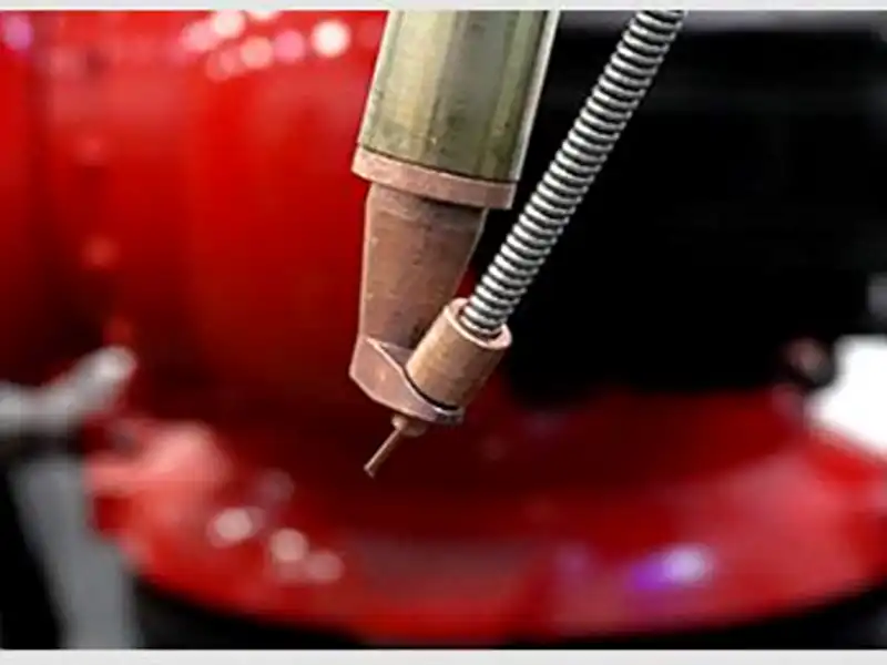 JCT hose-locked wire routing ensuring stable wire guidance at steep angles in automated laser welding.