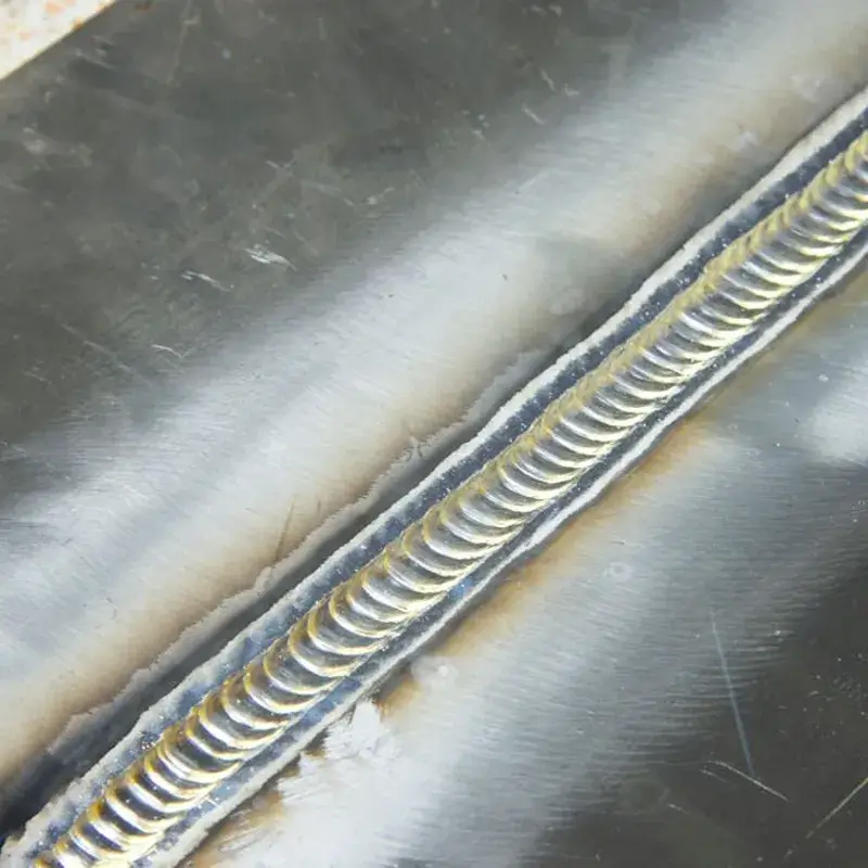 High-speed keyhole laser welding on stainless steel with zero spatter